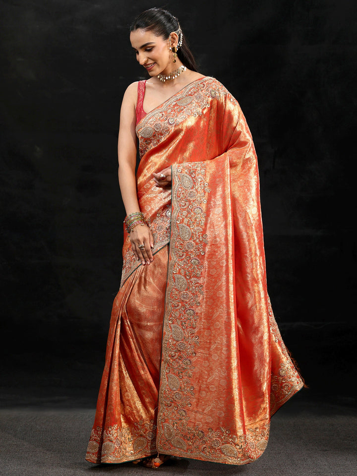 Libas Apricot Orange Woven Design Satin Saree with Embellished Border