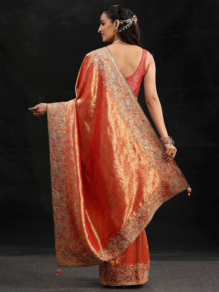 Libas Apricot Orange Woven Design Satin Saree with Embellished Border