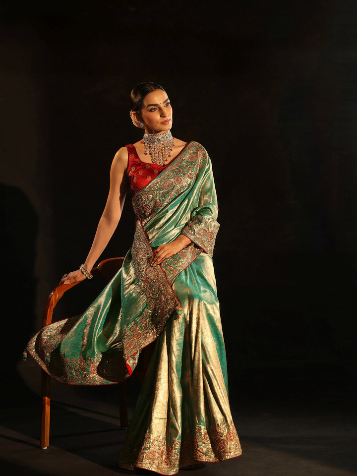 Libas Aqua Blue Woven Design Satin Saree with Embellished Border