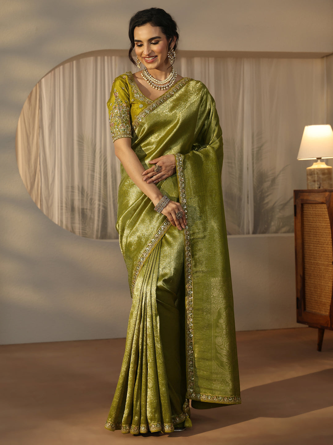 Libas Art Green Textured Silk Blend Saree with Embellished Border