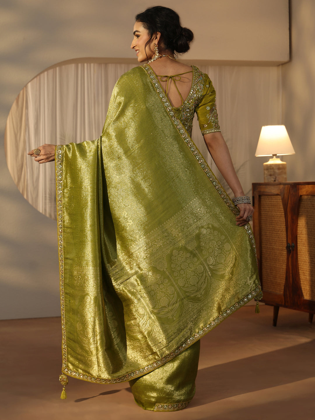 Libas Art Green Textured Silk Blend Saree with Embellished Border