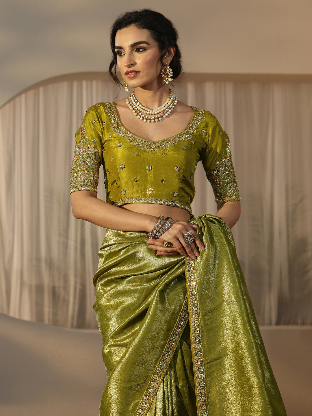 Libas Art Green Textured Silk Blend Saree with Embellished Border