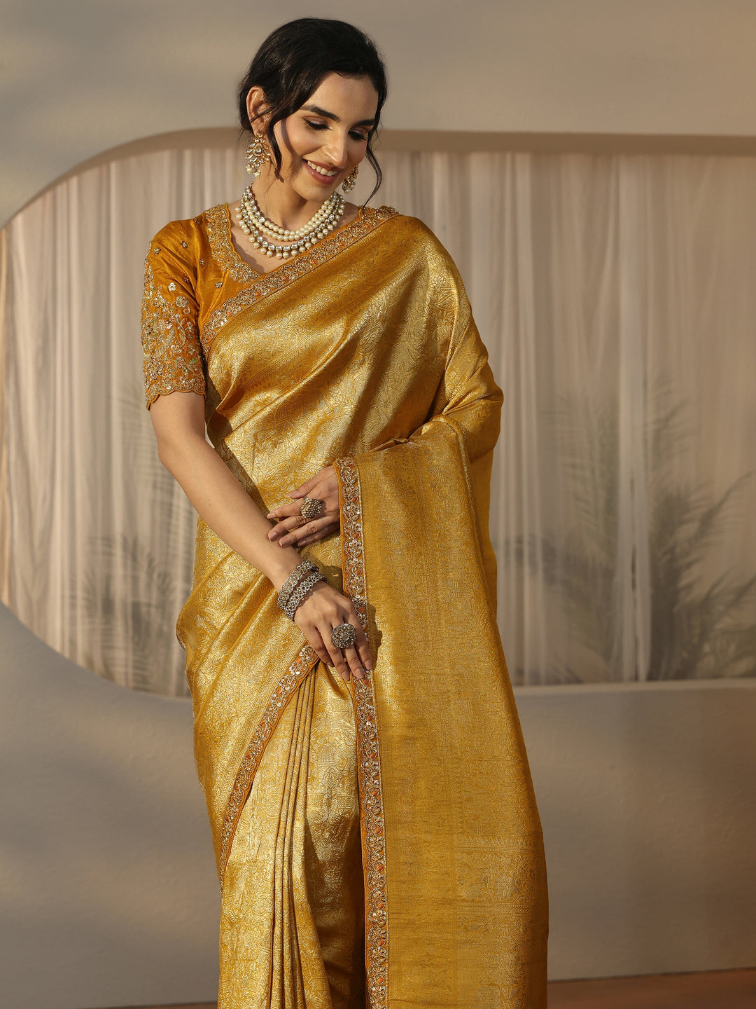 Libas Art Mustard Textured Silk Blend Saree with Embellished Border