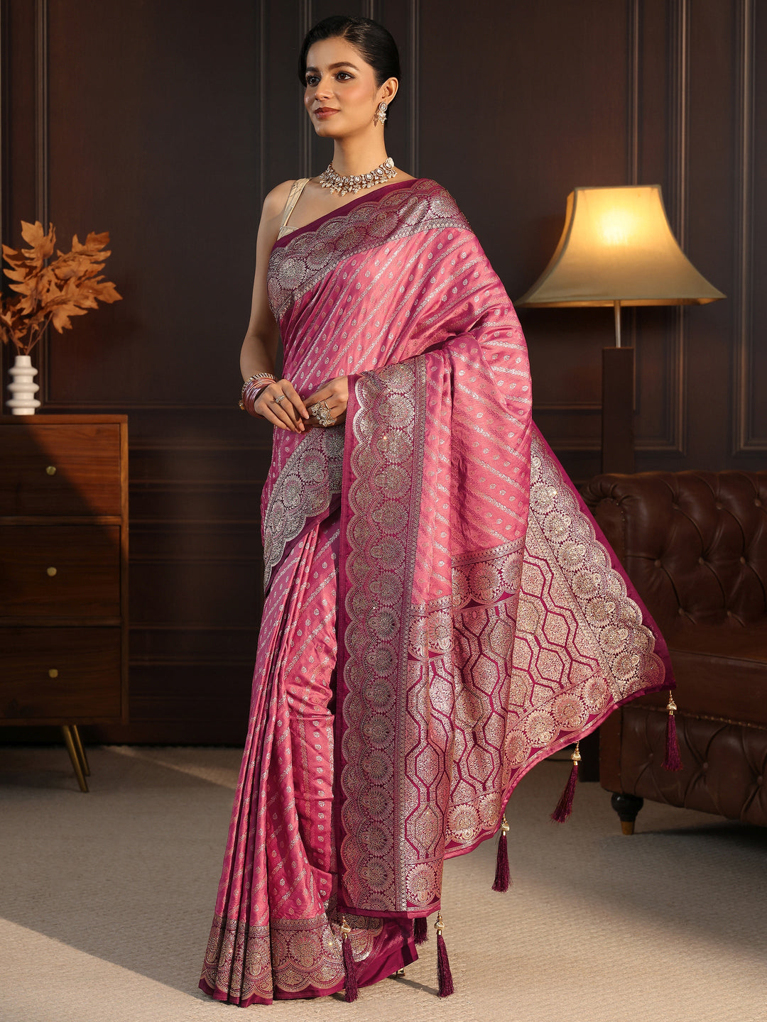 Libas Peach Woven Design Silk Blend Tassel Saree