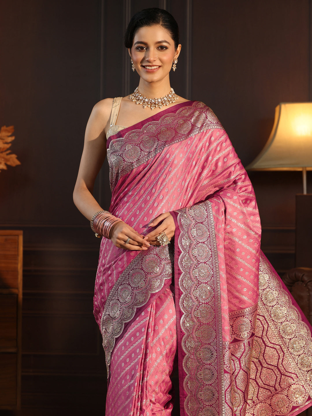 Libas Peach Woven Design Silk Blend Tassel Saree