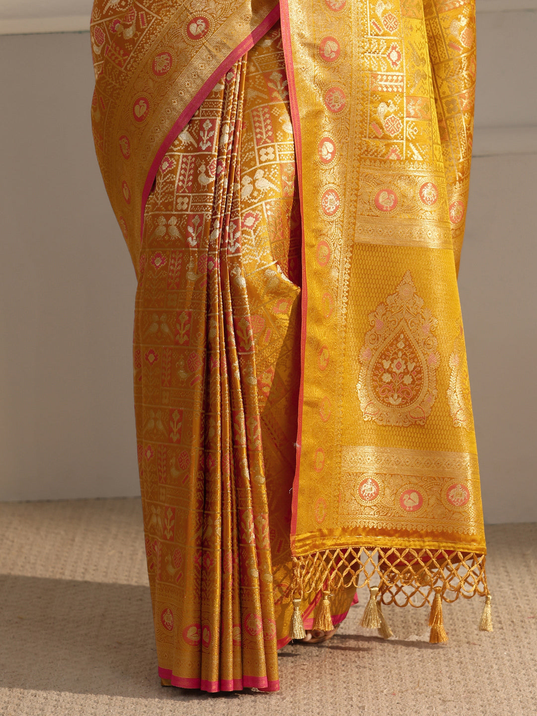 Libas Art Mustard Patola Woven Design Silk Blend Tassel Saree