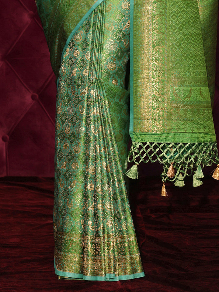 Libas Art Green Patola Style Woven Design Silk Blend Tassel Saree