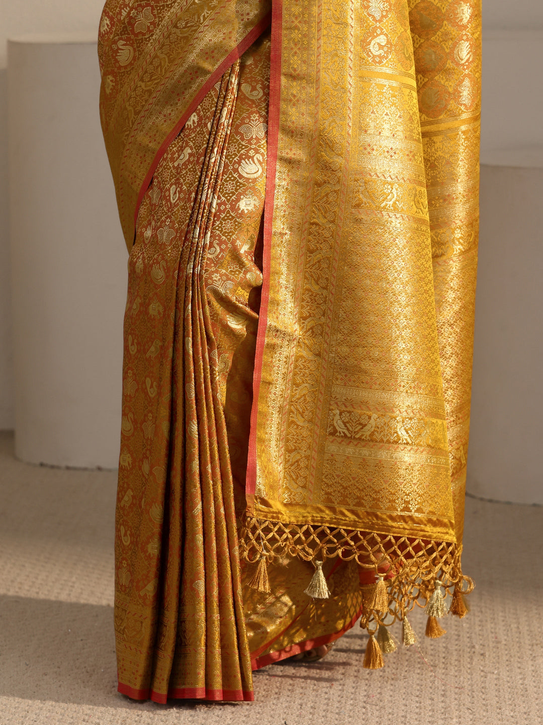 Libas Art Mustard Patola Woven Design Silk Blend Tassel Saree