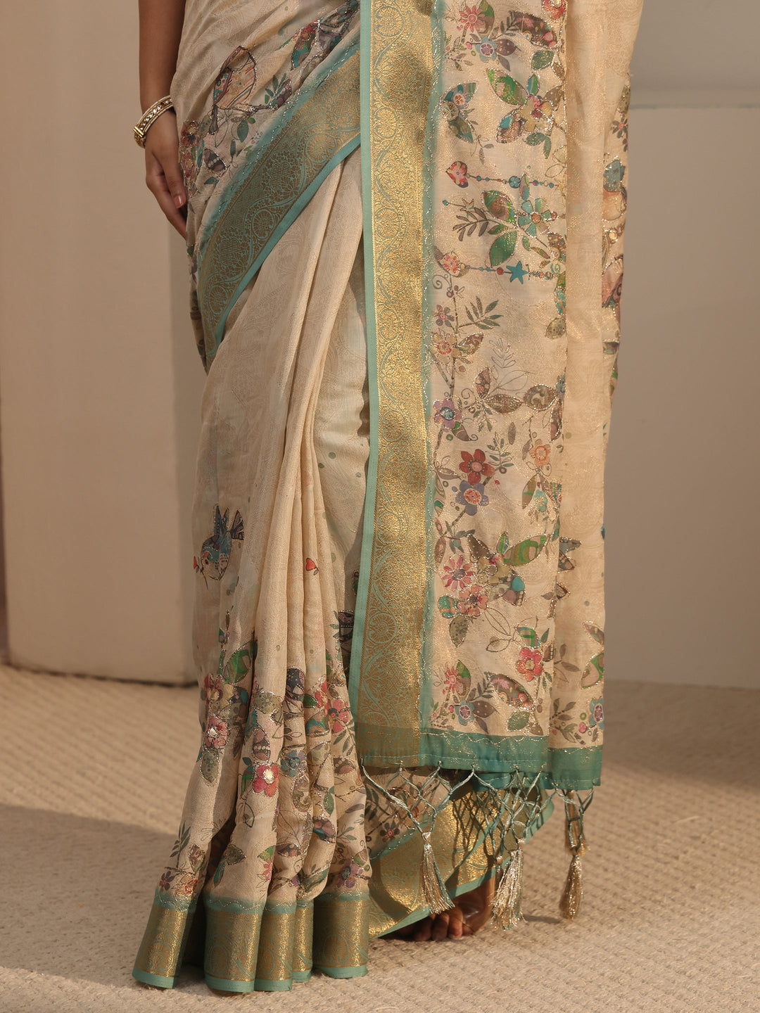 Libas Beige Floral Printed Silk Blend Tassel Saree with Woven Border