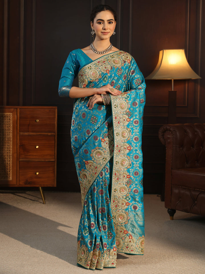 Libas Art Turquoise Woven Design Silk Blend Saree with Embellished Border