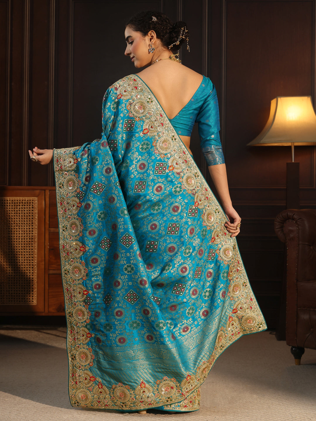Libas Art Turquoise Woven Design Silk Blend Saree with Embellished Border