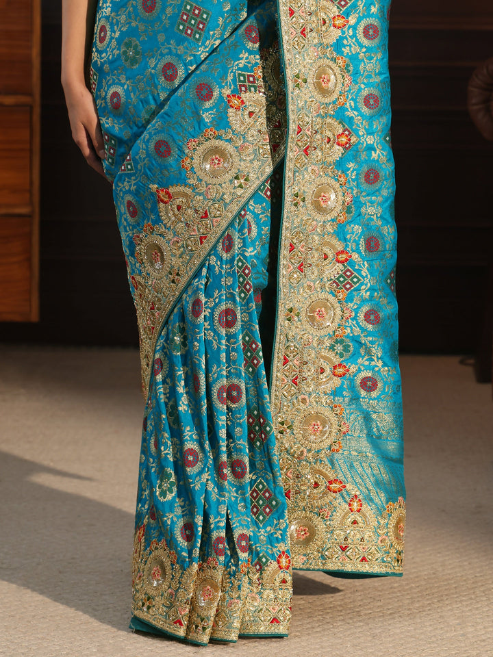 Libas Art Turquoise Woven Design Silk Blend Saree with Embellished Border