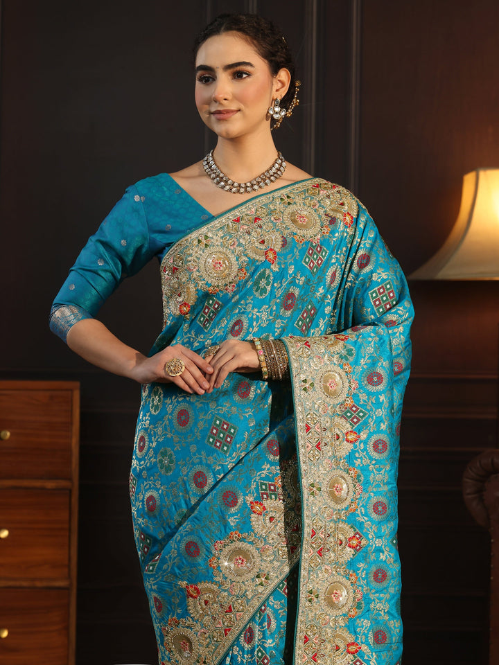 Libas Art Turquoise Woven Design Silk Blend Saree with Embellished Border