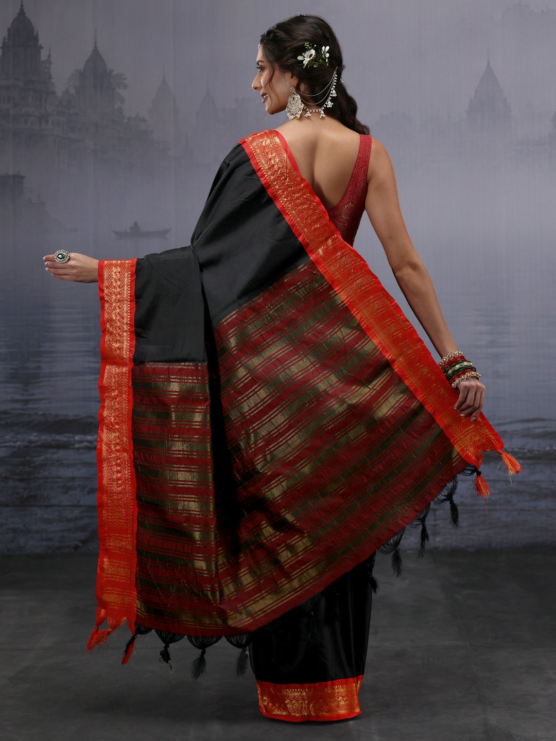 Libas Black and Orange Silk Blend Tassel Saree with Woven Border
