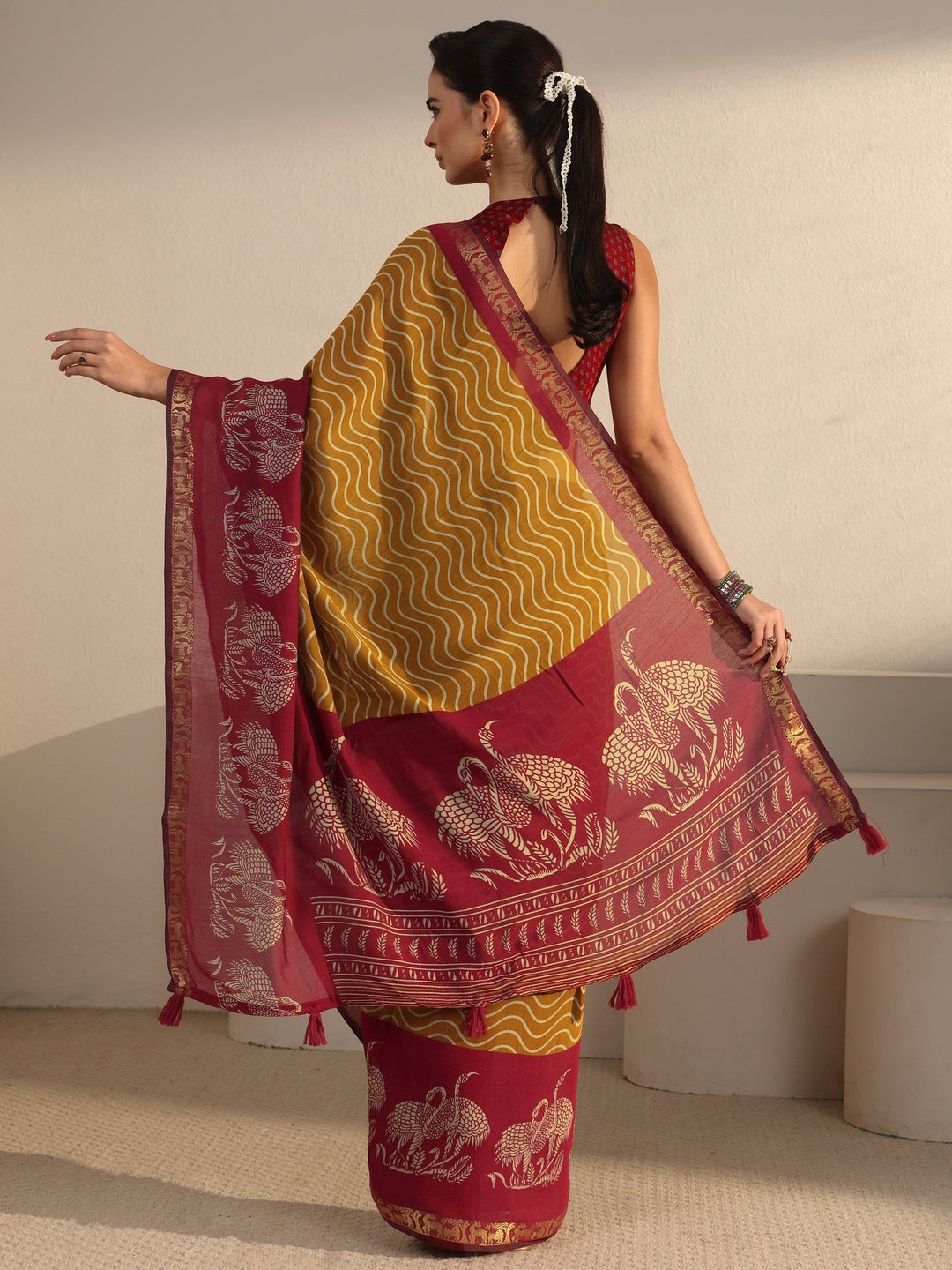 Libas Mustard and Red Wavy Stripe Printed Silk Blend Tassel Saree
