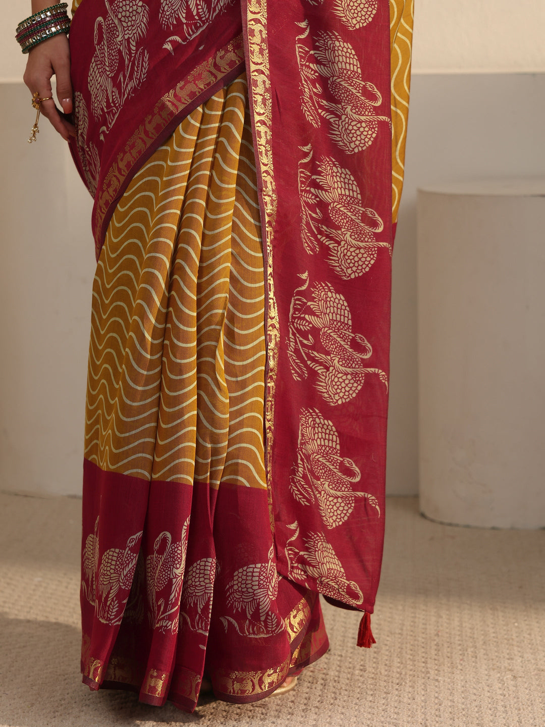 Libas Mustard and Red Wavy Stripe Printed Silk Blend Tassel Saree