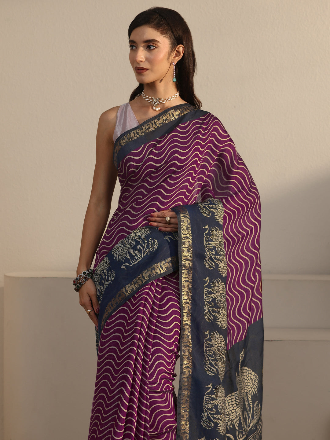 Libas Purple and Blue Wavy Stripe Printed Silk Blend Tassel Saree