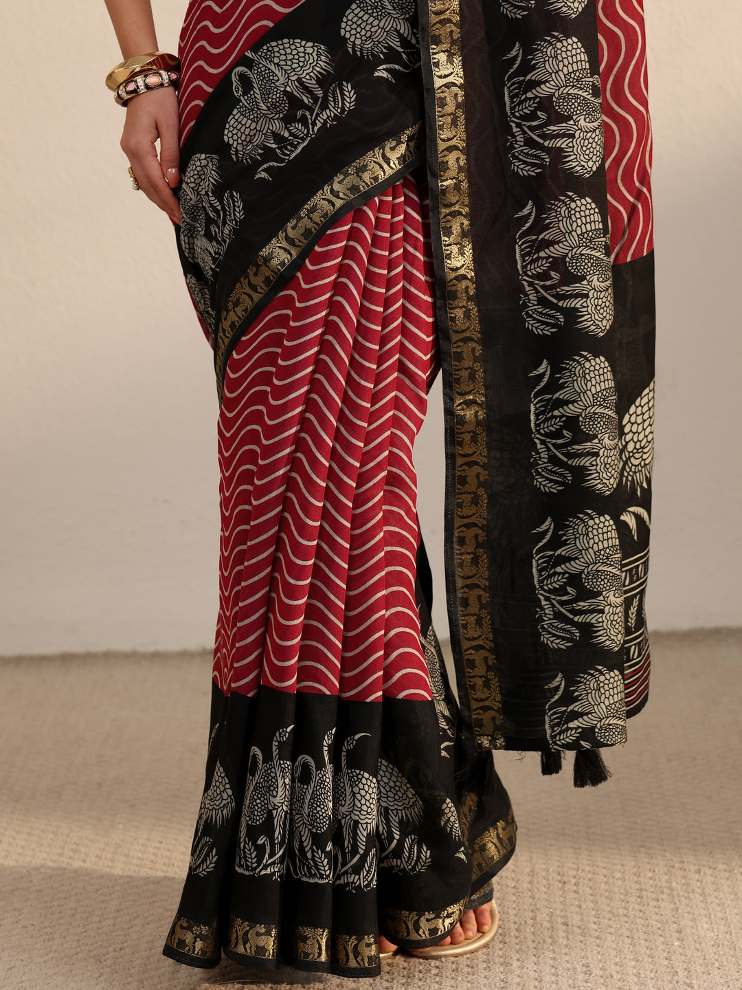 Libas Red and Black Wavy Stripe Printed Silk Blend Tassel Saree