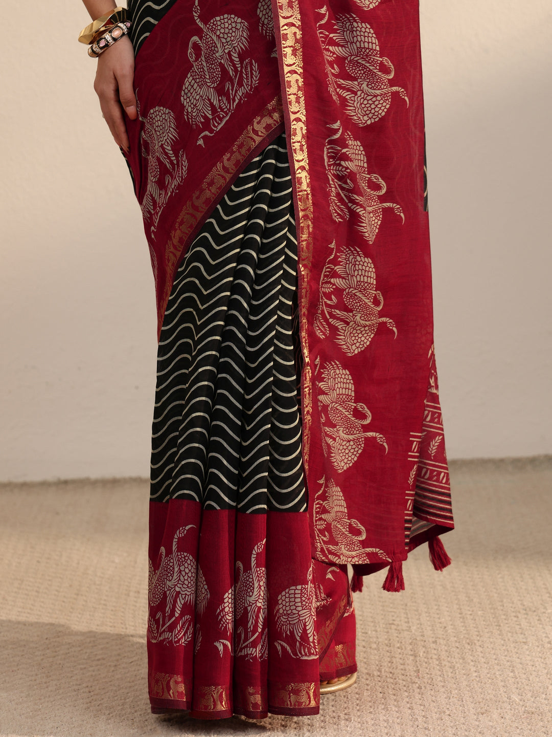 Libas Black and Red Wavy Stripe Printed Silk Blend Tassel Saree