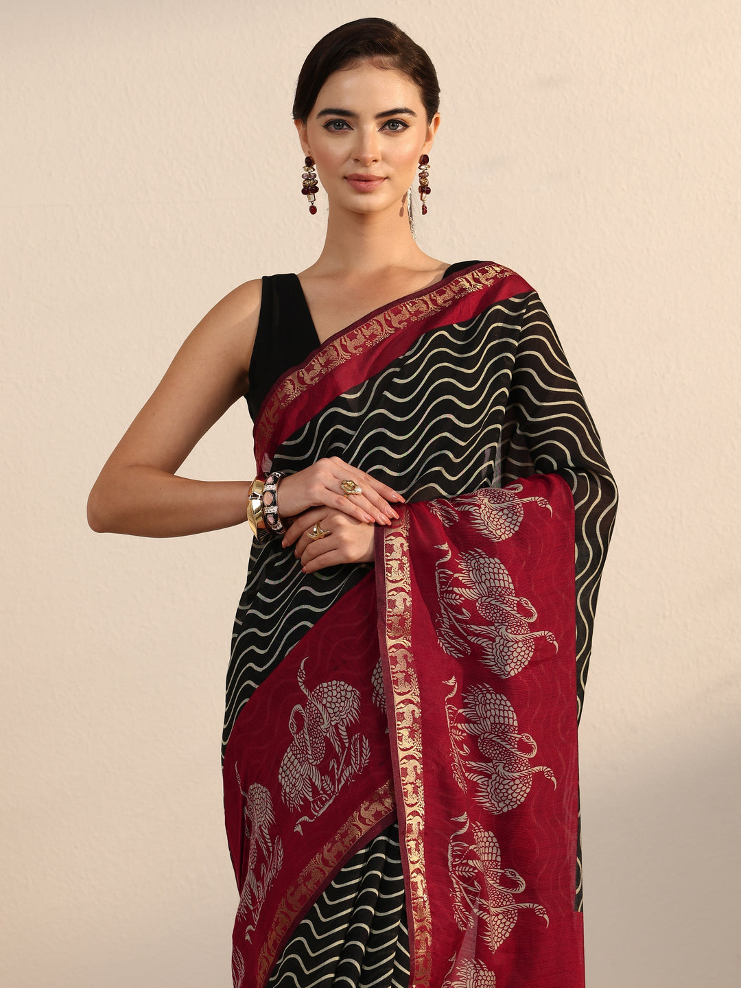 Libas Black and Red Wavy Stripe Printed Silk Blend Tassel Saree