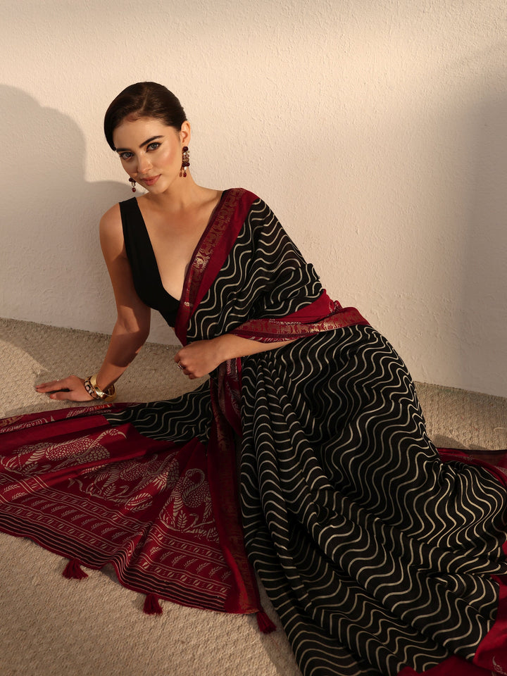 Libas Black and Red Wavy Stripe Printed Silk Blend Tassel Saree