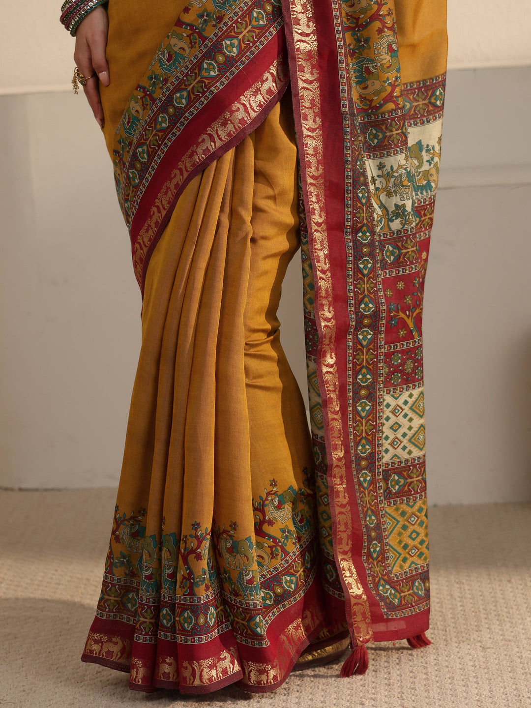 Libas Mustard and Red Printed Silk Blend Tassel Saree