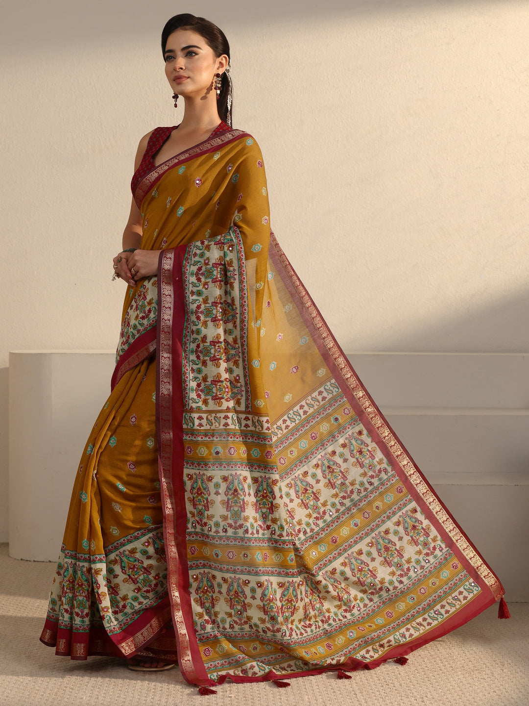 Libas Mustard and Red Printed Mirror Work Silk Blend Tassel Saree