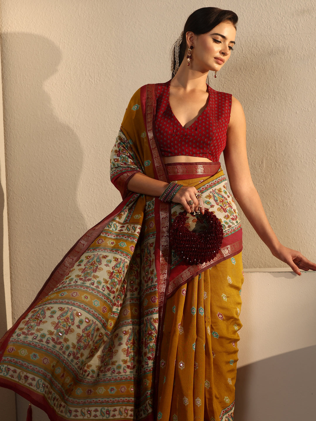 Libas Mustard and Red Printed Mirror Work Silk Blend Tassel Saree