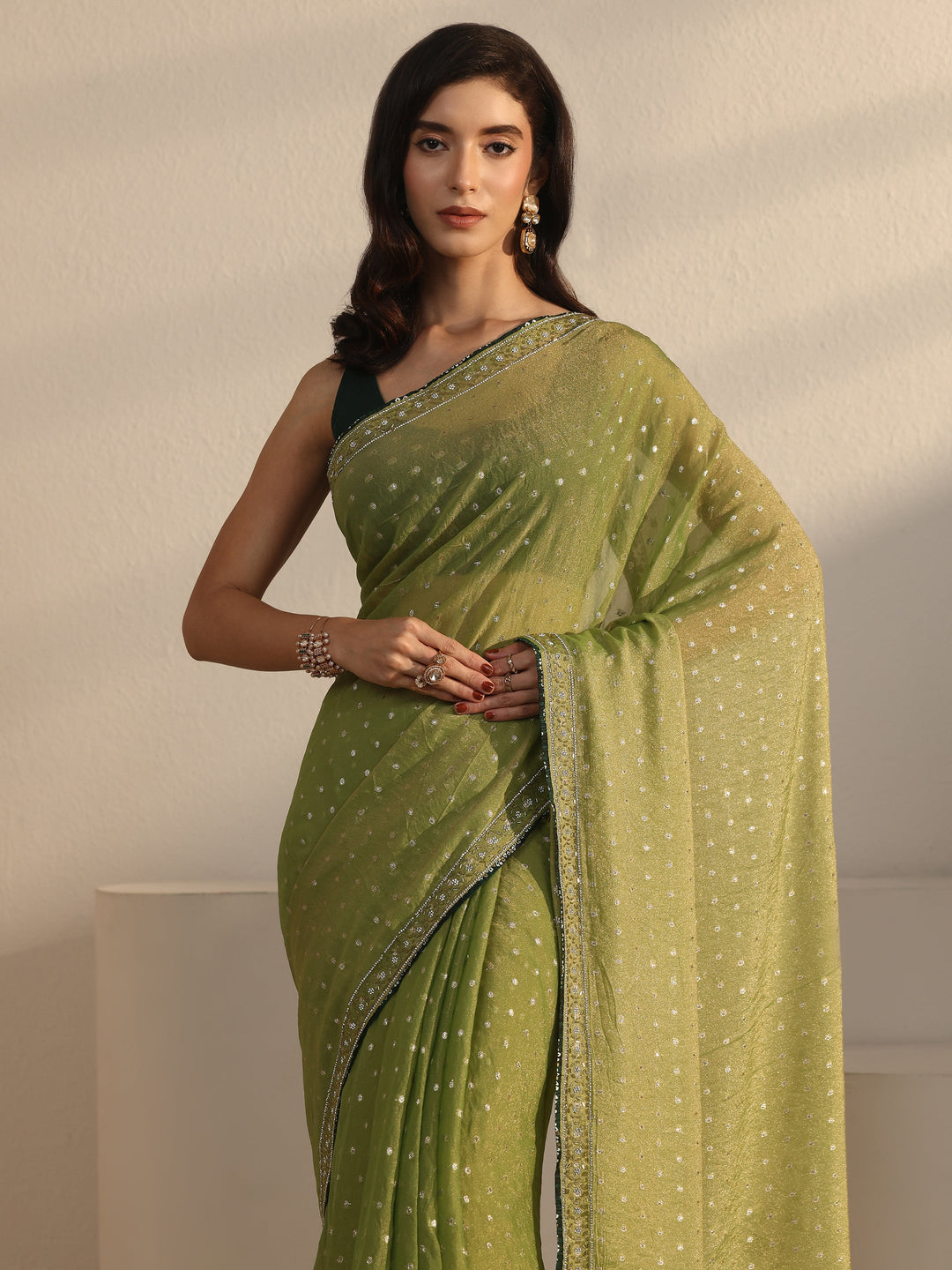 Libas Green Woven Design Tissue Saree with Embellished Border