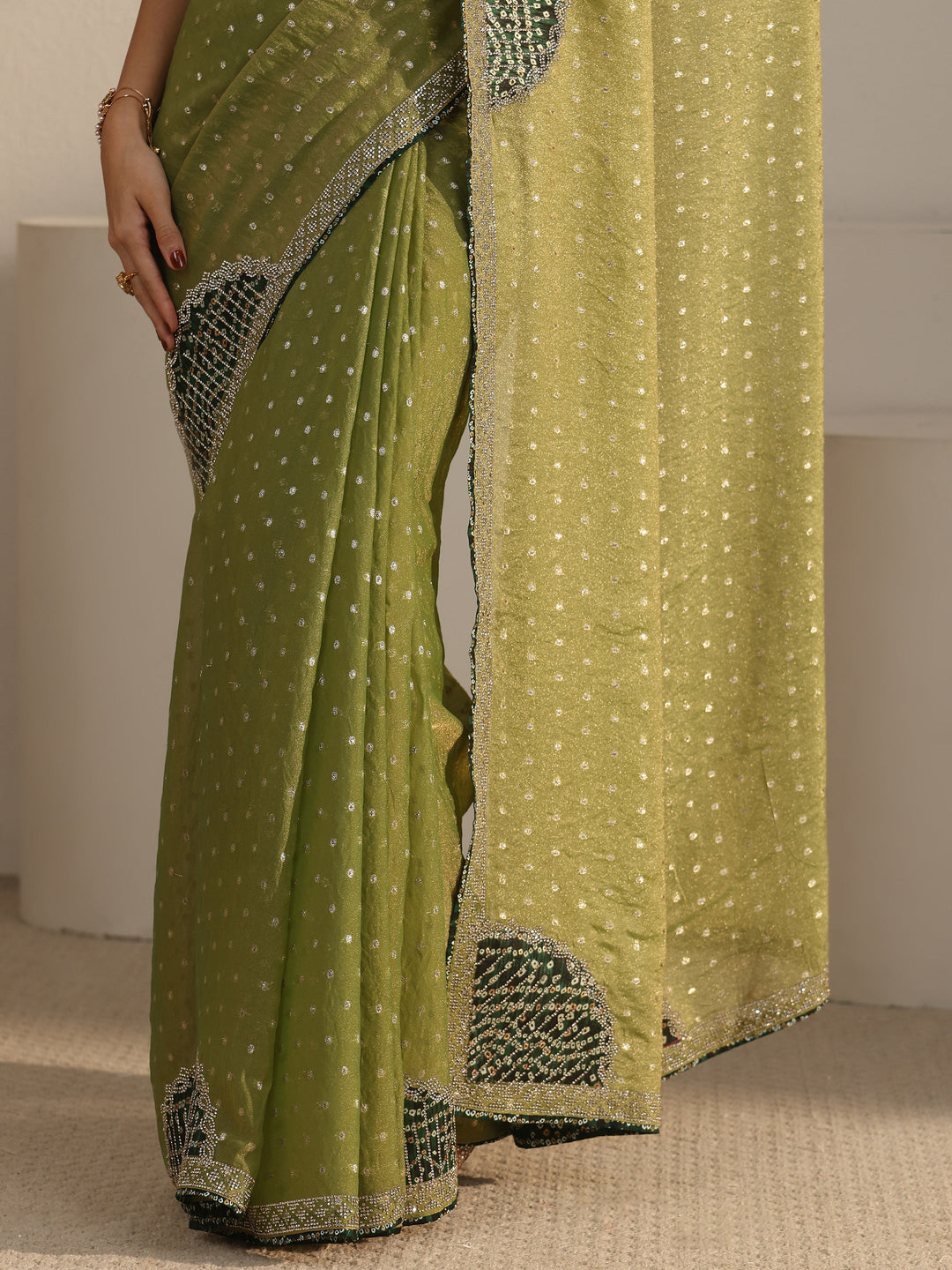 Libas Green Woven Design Tissue Saree with Embellished Border