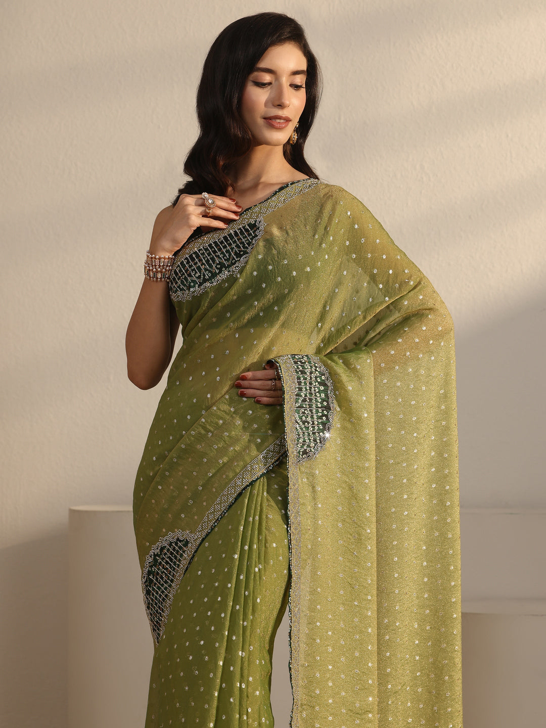 Libas Green Woven Design Tissue Saree with Embellished Border