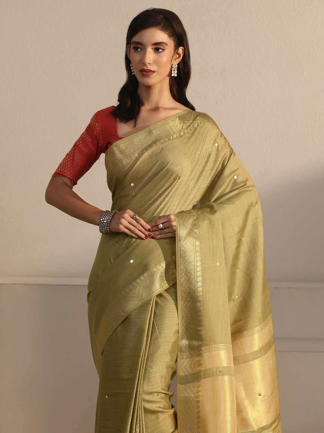 Libas Pista Green Woven Design Silk Blend Tassel Saree