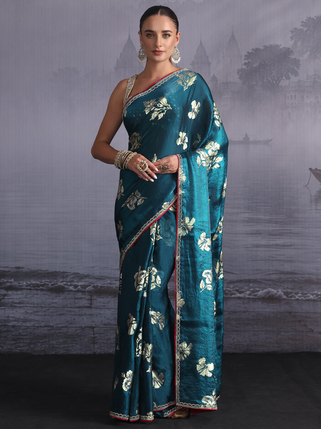 Libas Teal Blue Floral Printed Tissue Saree with Embellished Border