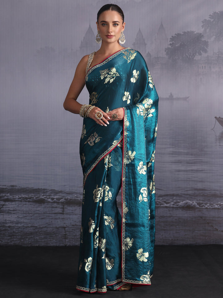 Libas Teal Blue Floral Printed Tissue Saree with Embellished Border