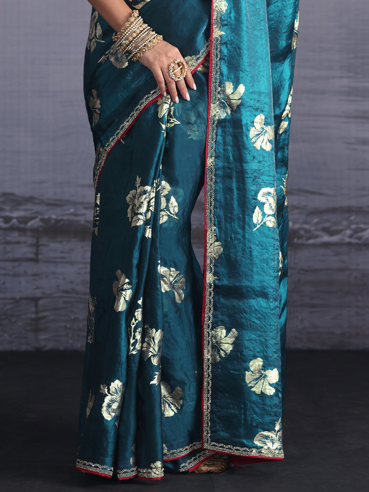 Libas Teal Blue Floral Printed Tissue Saree with Embellished Border