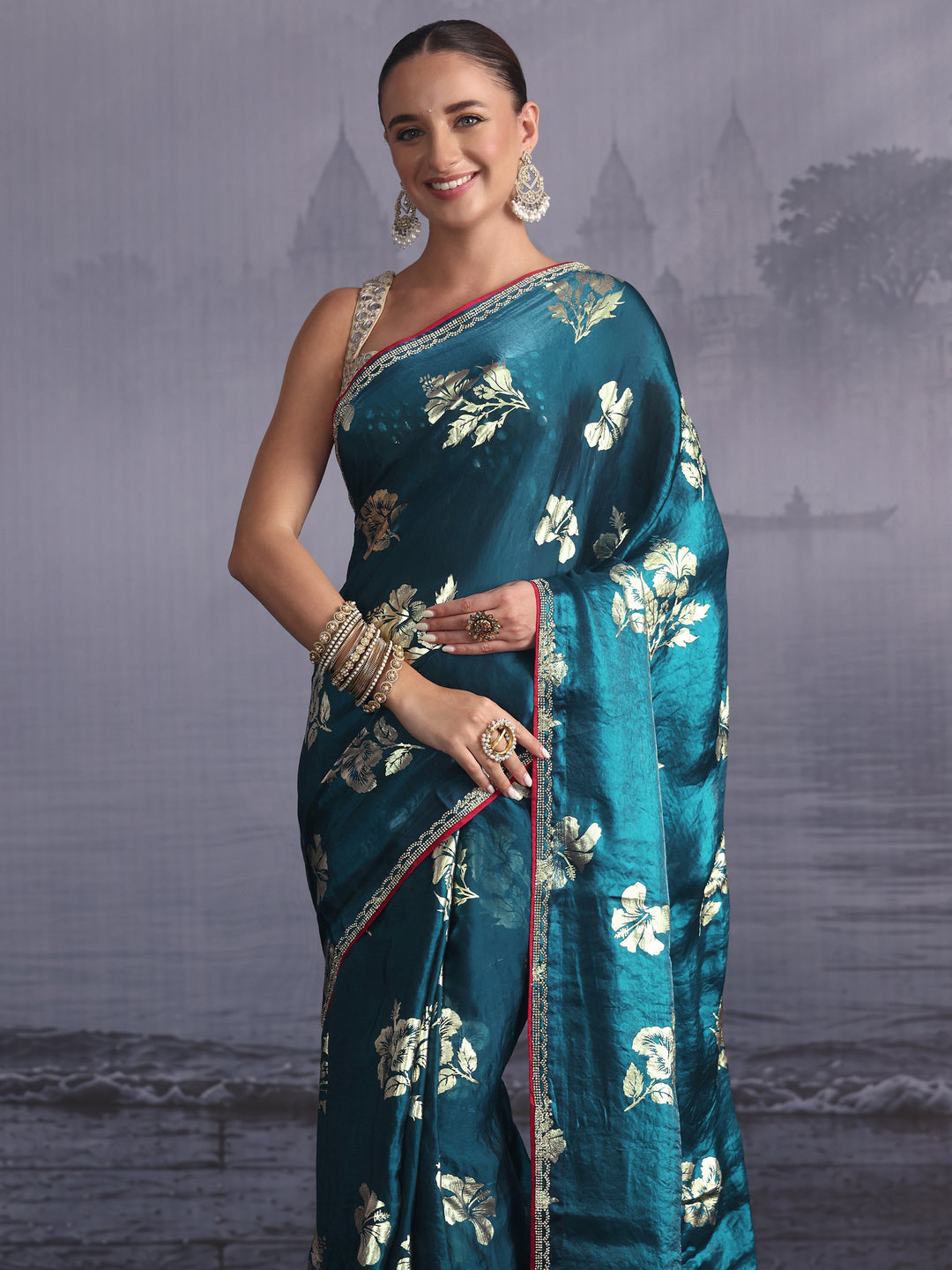 Libas Teal Blue Floral Printed Tissue Saree with Embellished Border