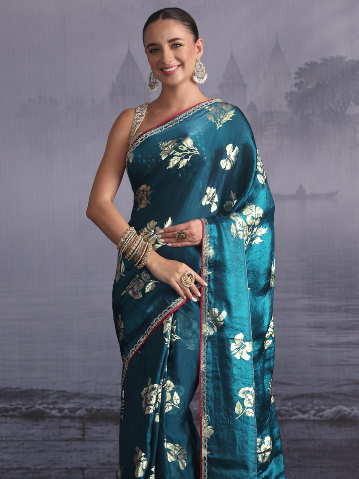 Libas Teal Blue Floral Printed Tissue Saree with Embellished Border