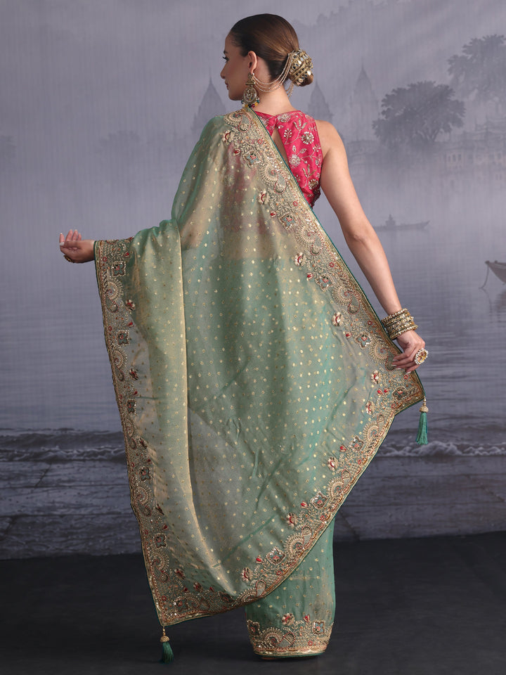 Libas Green Woven Design Tissue Saree with Embroidered Border