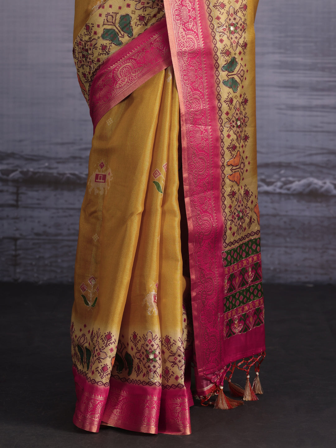 Libas Mustard Patola Print Embellished Silk Blend Tassel Saree