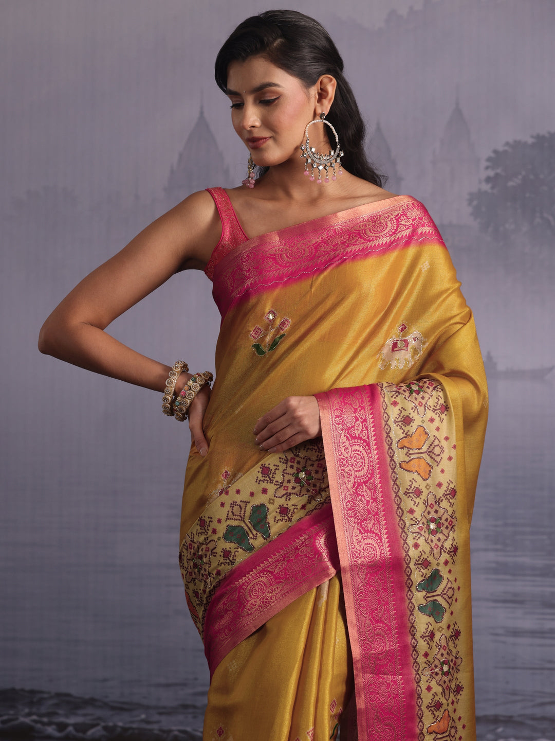 Libas Mustard Patola Print Embellished Silk Blend Tassel Saree
