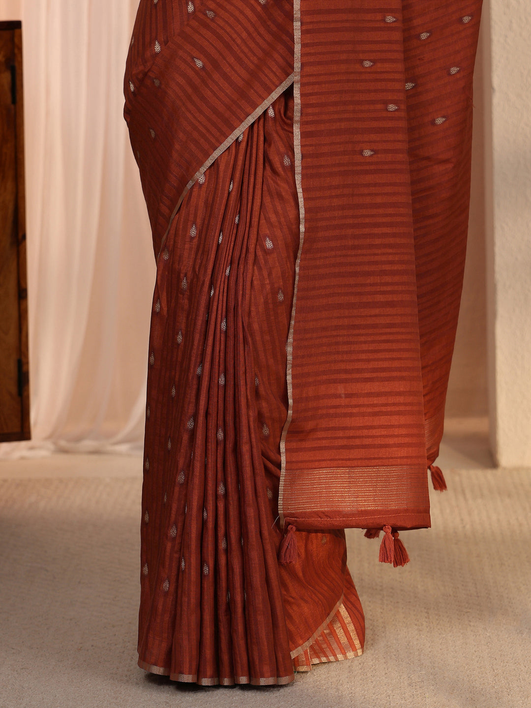 Libas Rust Leaf Woven Design Textured Silk Blend Tassel Saree