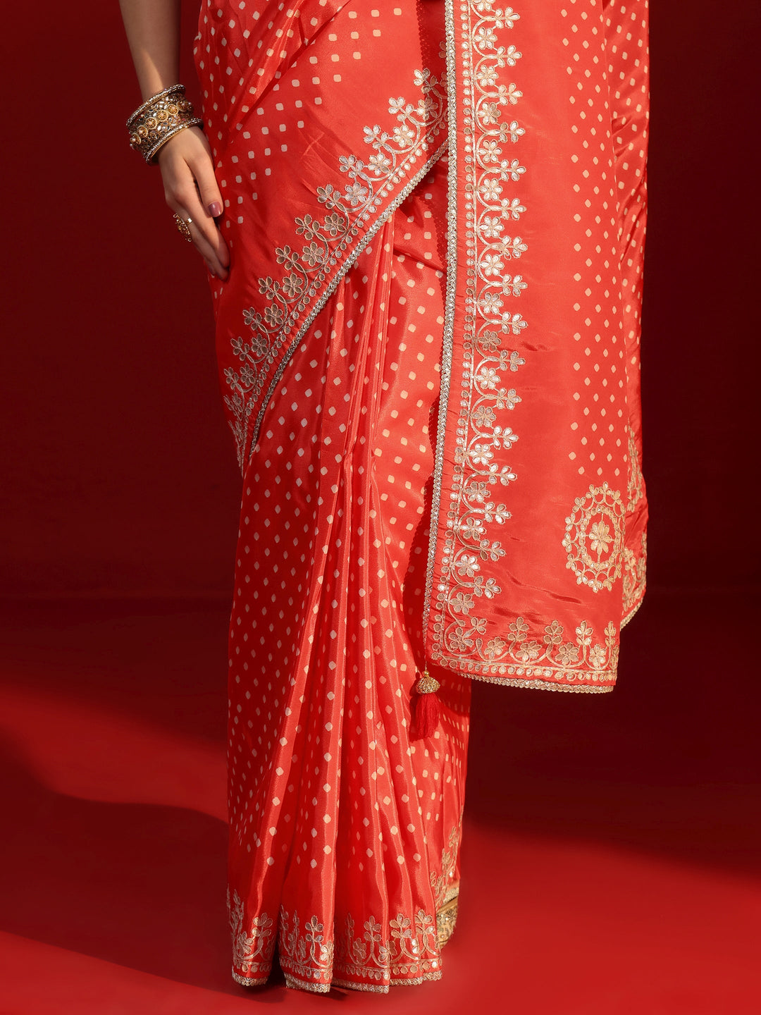 Libas Orange Printed Satin Saree with Embroidered Border