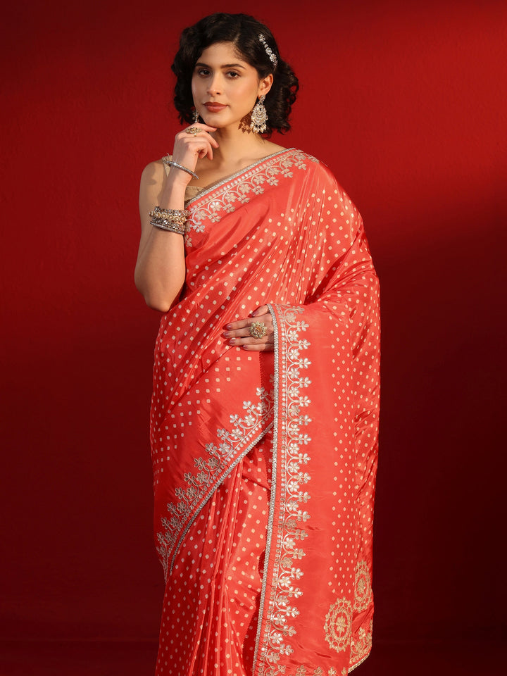 Libas Orange Printed Satin Saree with Embroidered Border