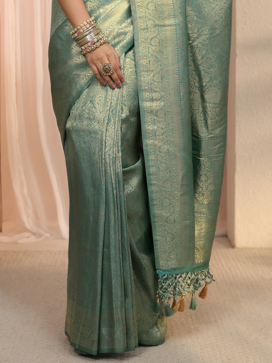 Libas Green Woven Design Silk Blend Tassel Saree