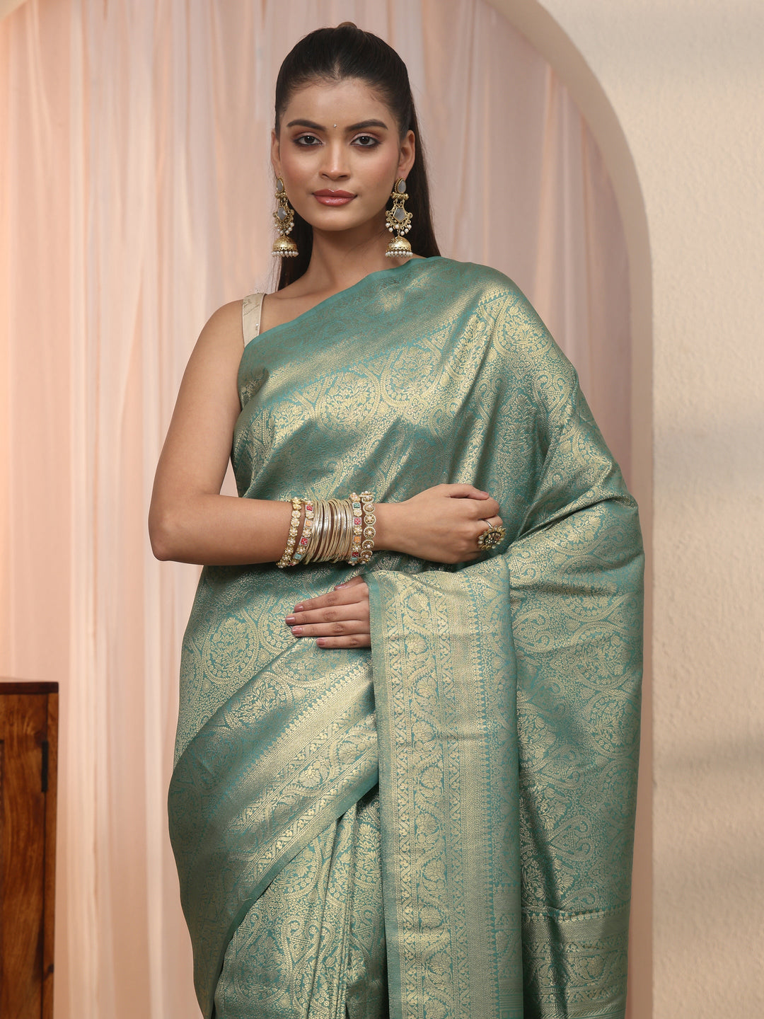 Libas Green Woven Design Silk Blend Tassel Saree