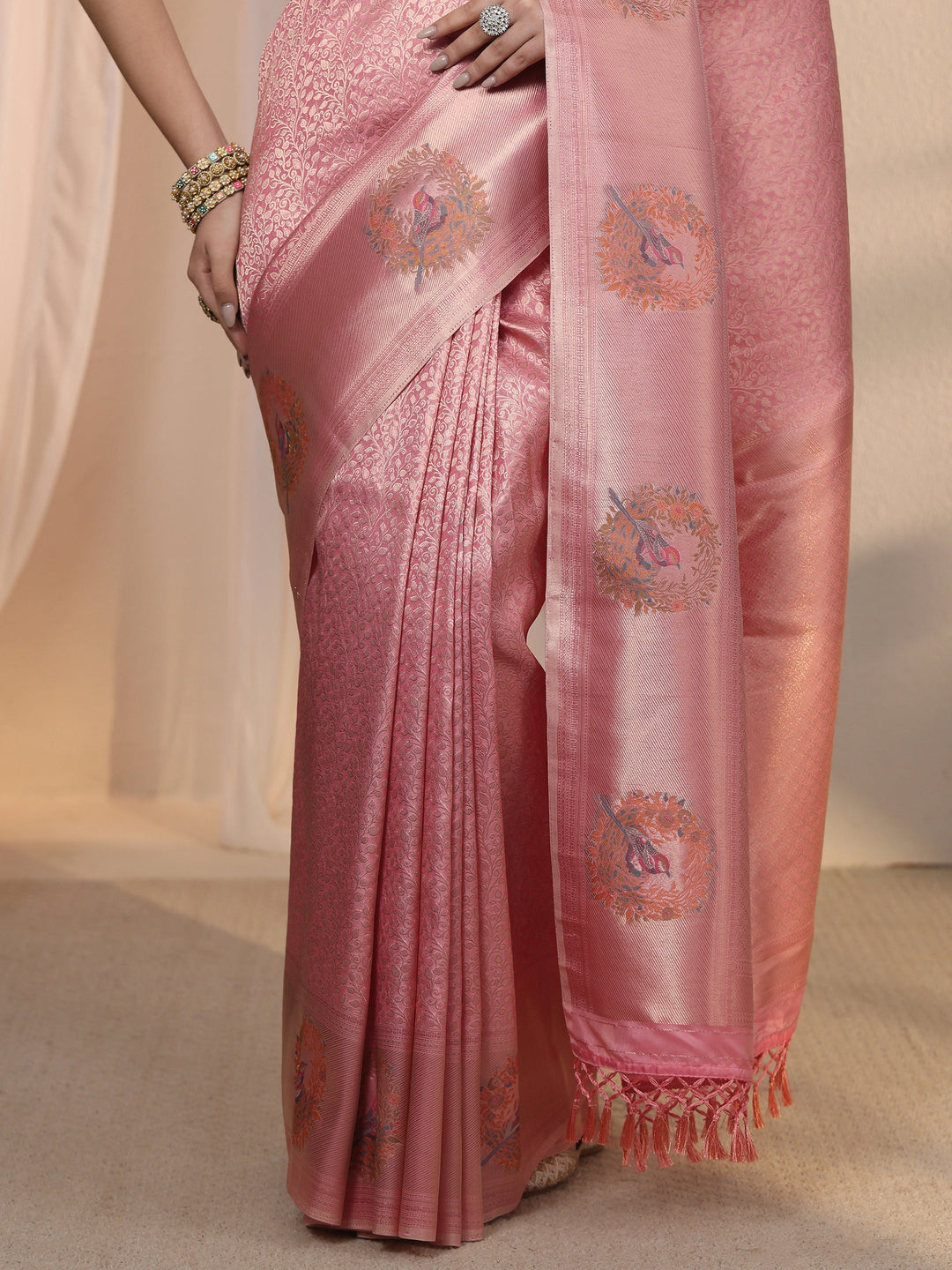Libas Peach Floral Woven Design Silk Blend Tassel Saree