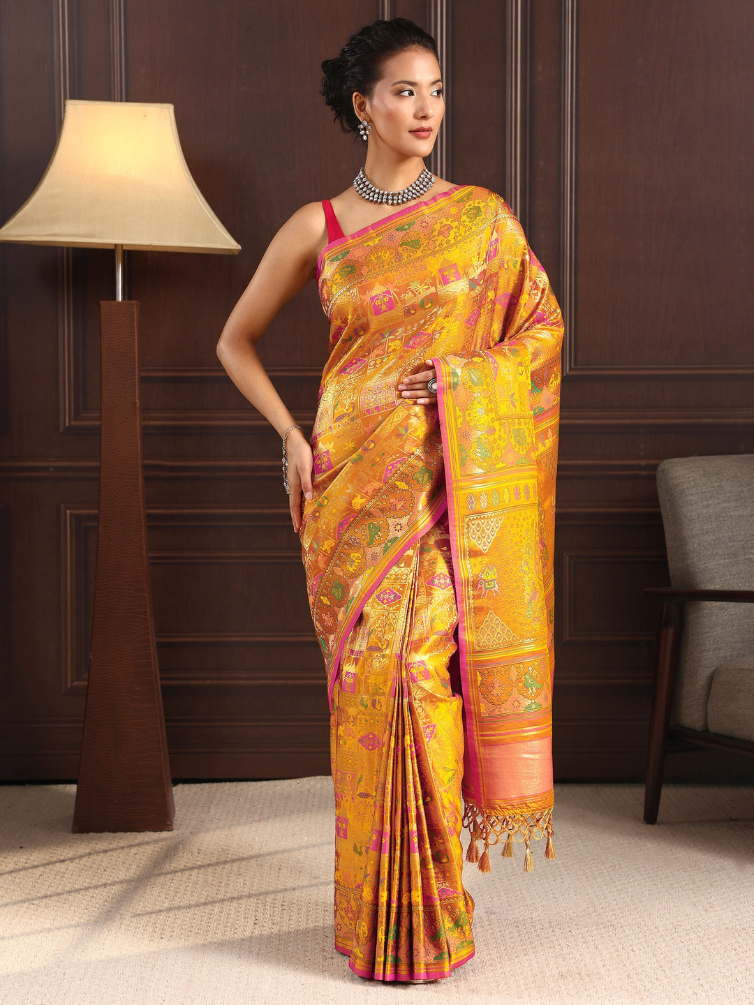 Libas Art Mustard Patola Style Woven Design Silk Blend Tassel Saree