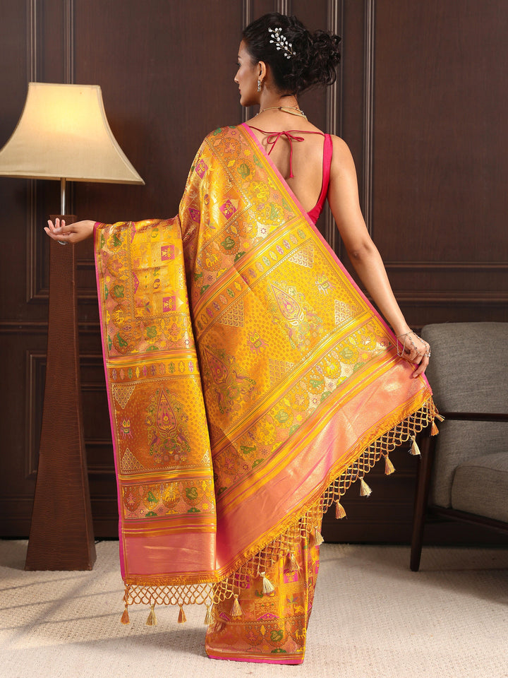 Libas Art Mustard Patola Style Woven Design Silk Blend Tassel Saree