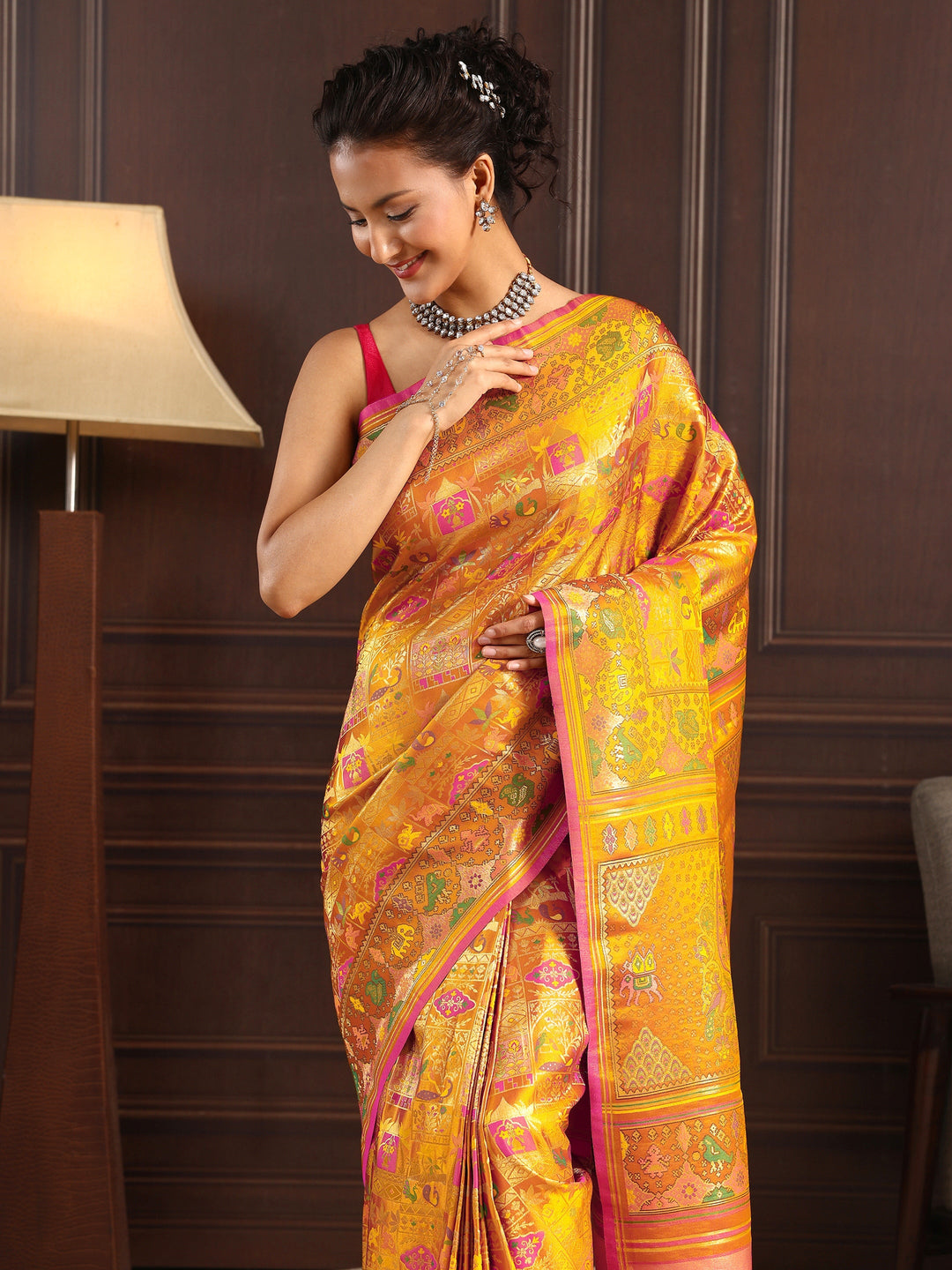 Libas Art Mustard Patola Style Woven Design Silk Blend Tassel Saree