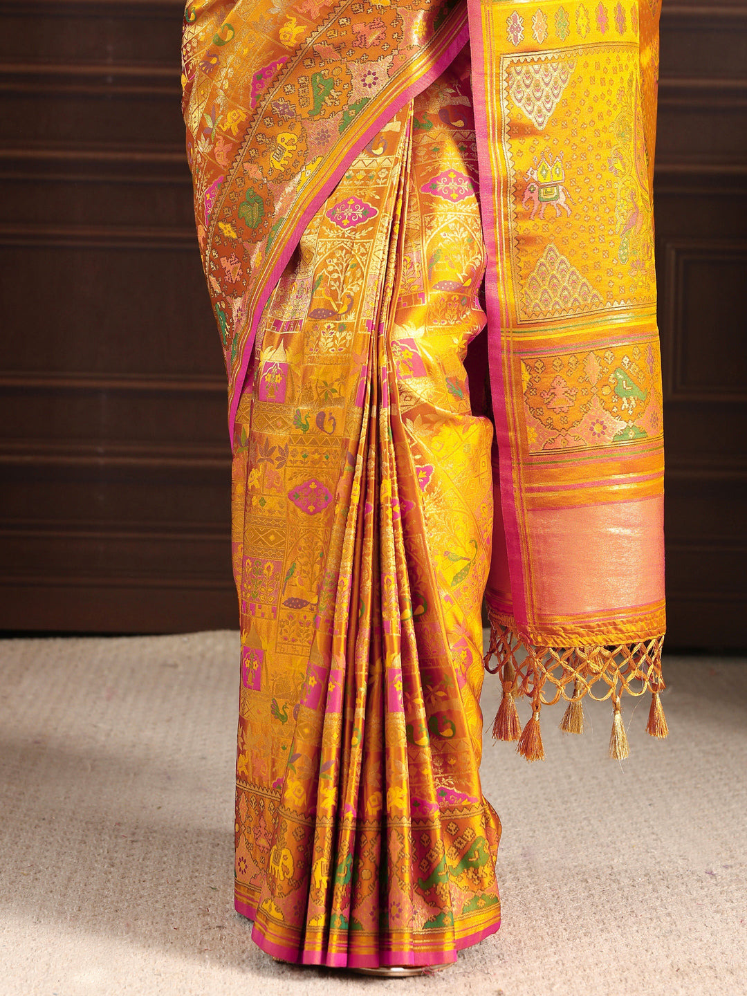 Libas Art Mustard Patola Style Woven Design Silk Blend Tassel Saree